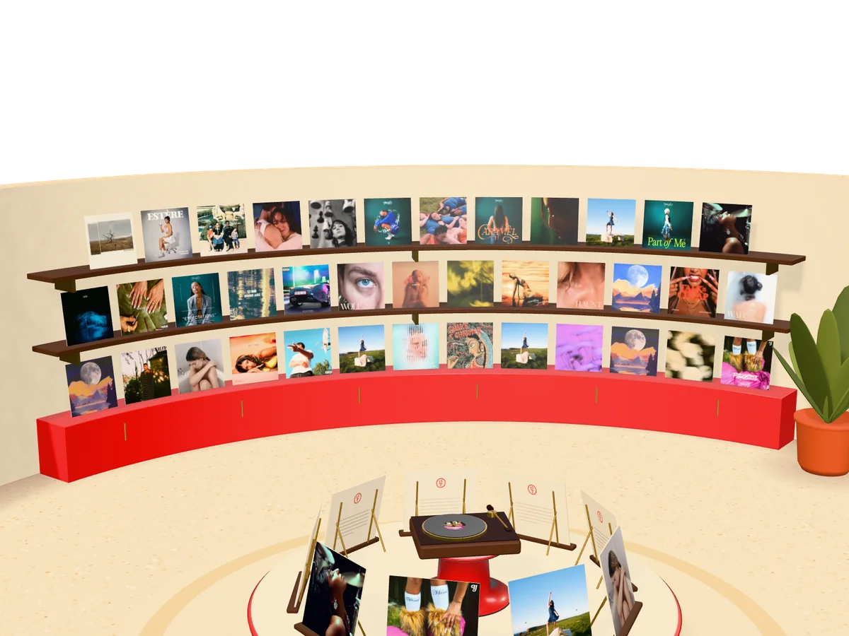 The record wall: every goodtwin release on curved shelves above a red cabinet
